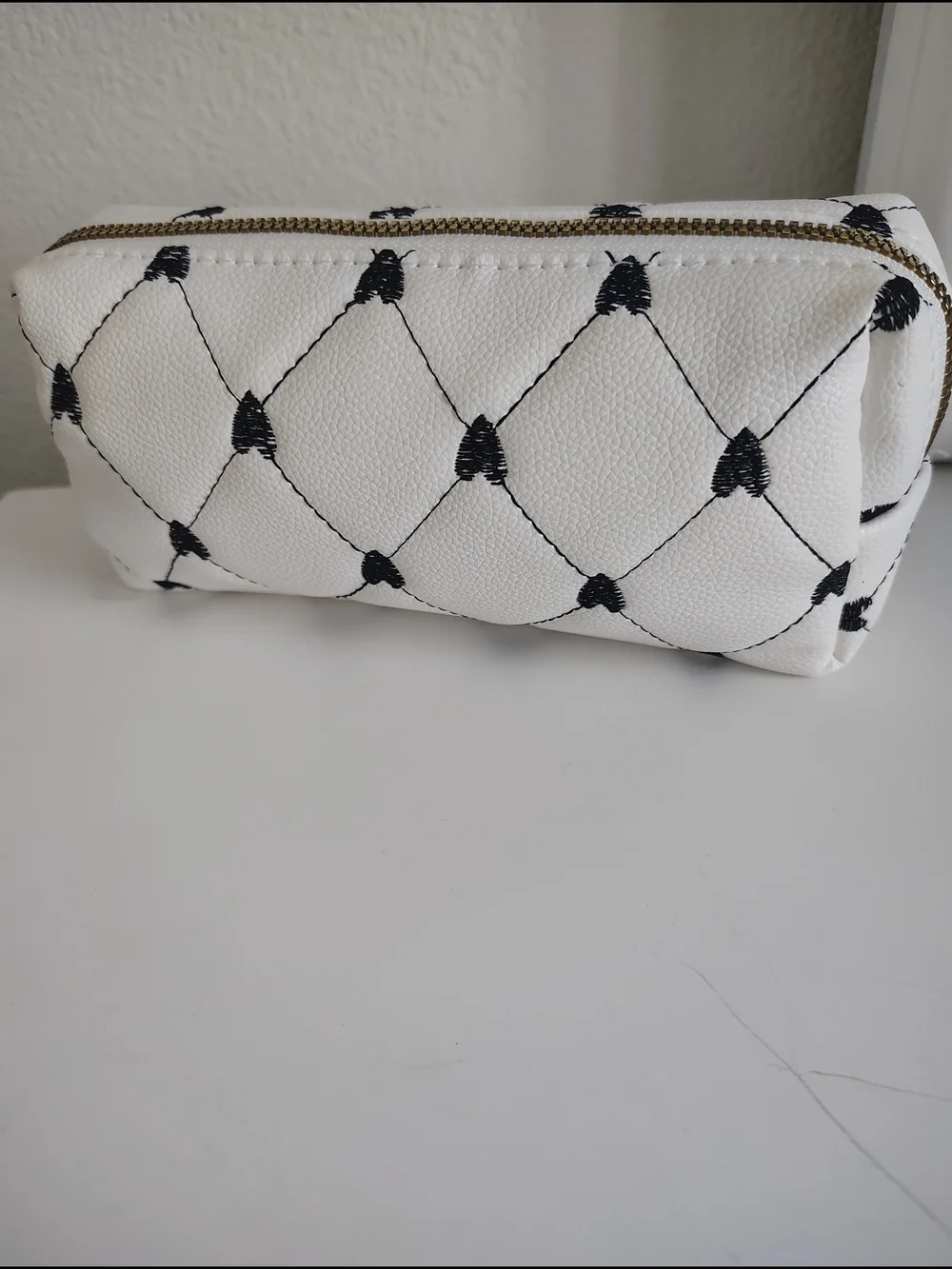 White Quilted Heart Pattern Cosmetic Bag with Gold Zip